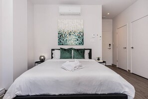 1 bedroom, desk, iron/ironing board, travel cot