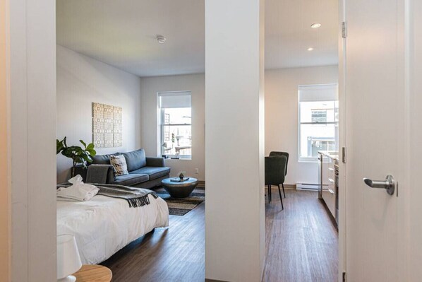 1 bedroom, desk, iron/ironing board, travel crib