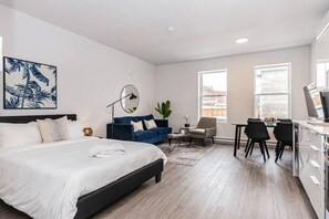 1 bedroom, desk, iron/ironing board, travel crib