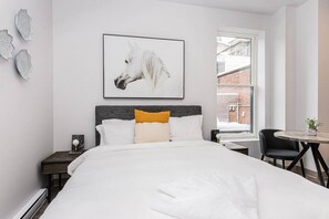 1 bedroom, desk, iron/ironing board, travel cot