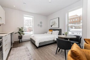 1 bedroom, desk, iron/ironing board, travel cot