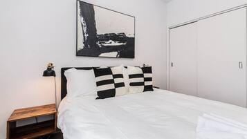 2 bedrooms, desk, iron/ironing board, travel crib