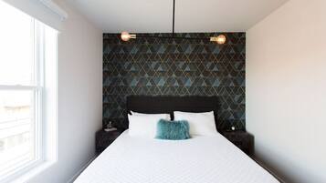 1 bedroom, desk, iron/ironing board, travel crib