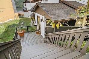 Staircase leads to a residential area with a scenic view of the water.