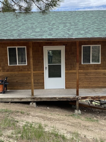 Exterior detail. Rustic cabin with lake views.