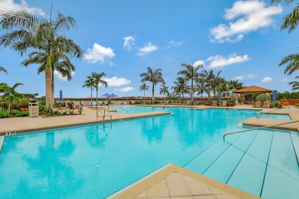 Condo, Multiple Beds (Beachy condo in Artesia with pool, gy) | Pool | A heated pool - Beachy Condo in Artesia With Pool, gym and Pickleball (Naples)