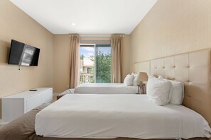 Relax in this stylish room with two beds, a flat-screen TV, and a desk.