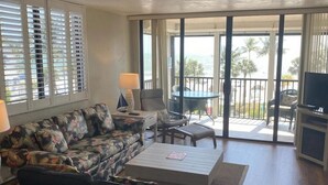 Condo, 2 Bedrooms | Living room - Caper Beach Club 412 by Coastal Vacation Properties (Fort Myers Beach)