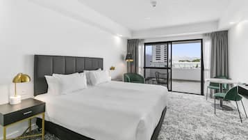 Premium bedding, pillow-top beds, laptop workspace, free WiFi