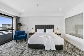 Premium bedding, pillow-top beds, laptop workspace, free WiFi