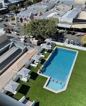 Outdoor pool, open 7:00 AM to 9:00 PM, pool umbrellas, sun loungers