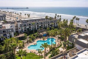 Enjoy a refreshing swim surrounded by palm trees and stunning ocean views.