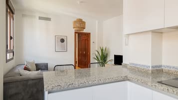 Apartment, 2 Bedrooms | Private kitchen | Mini-fridge, microwave, coffee/tea maker, toaster