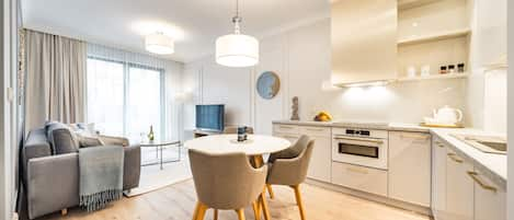 Premium appartement | Woonruimte | Een flatscreentelevisie