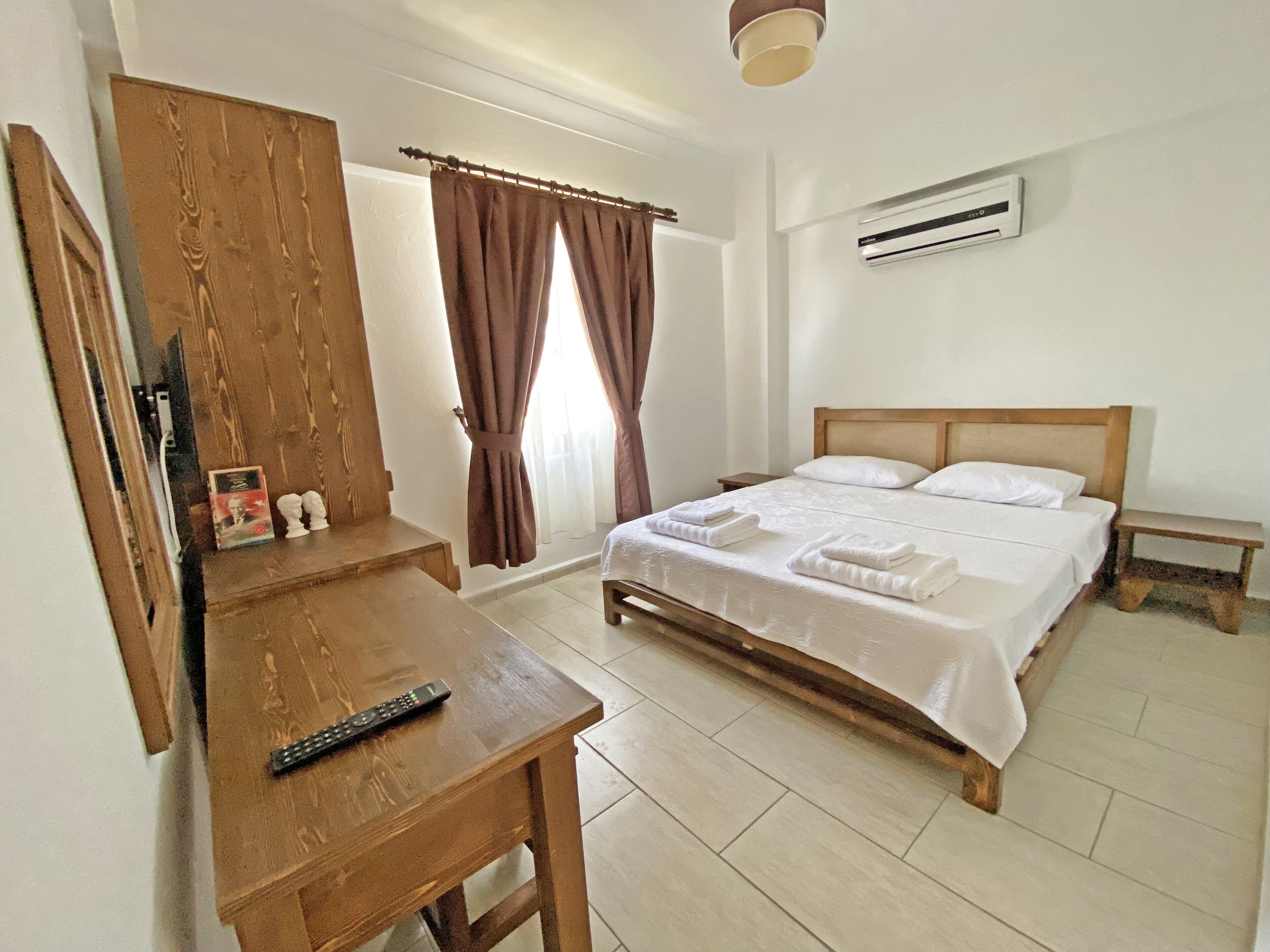Quarto casal standard, vista para o jardim | Frigobar, Wi-Fi de cortesia, roupa de cama