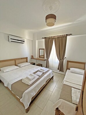 Standard Triple Room, Garden View | Minibar, free WiFi, bed sheets - Malbec Otel (Bozcaada)