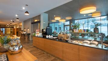 Breakfast, lunch, dinner served; international cuisine, garden views