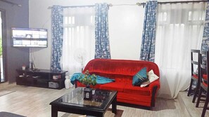 Appartement Deluxe | Salle de séjour