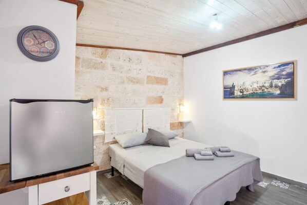 Fer et planche à repasser, draps fournis