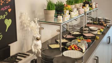 Daily buffet breakfast (EUR 14 per person)