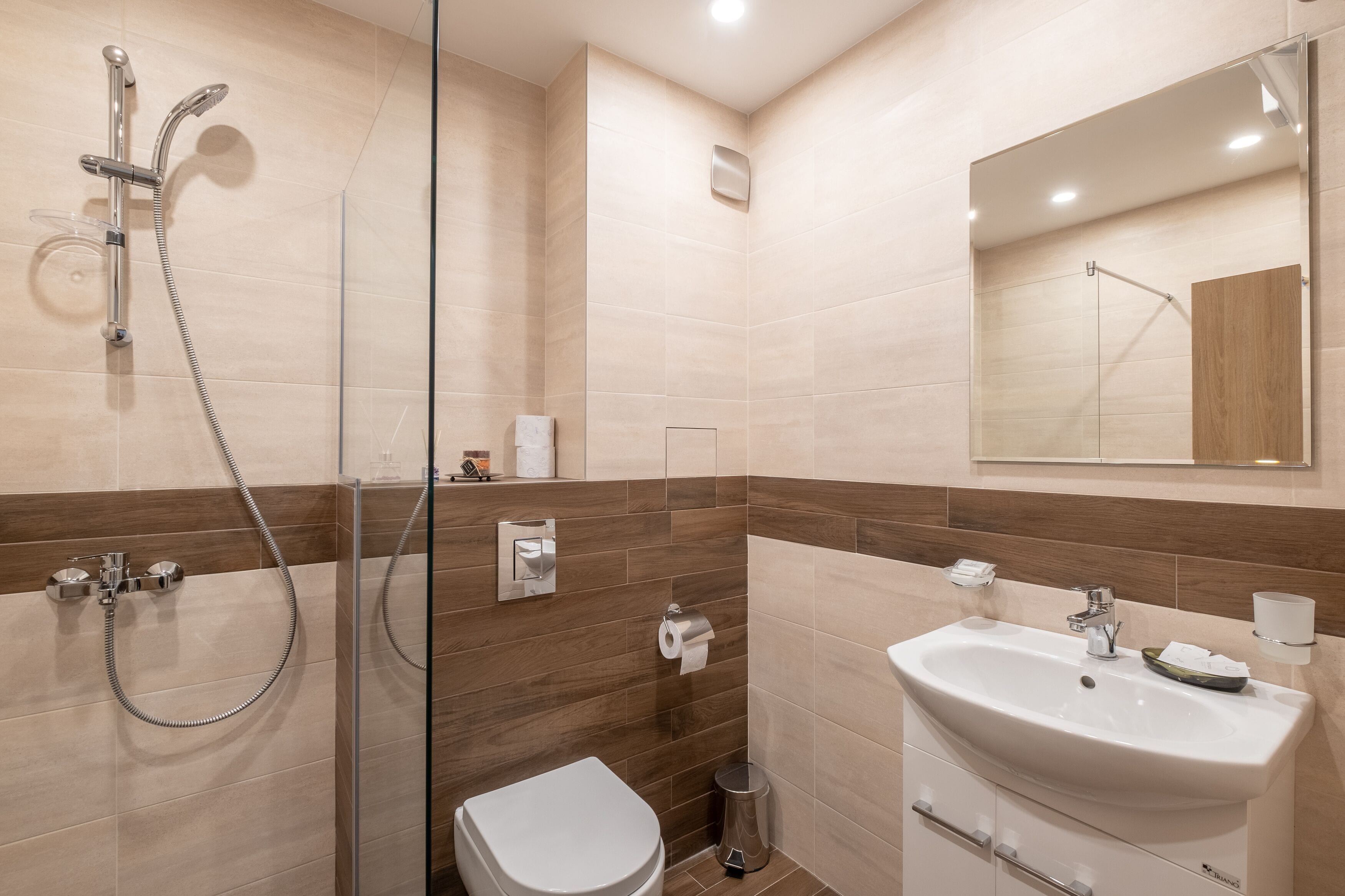 Shower, free toiletries, hair dryer, slippers