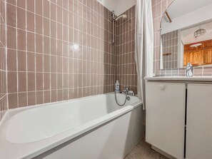 Bathtub, hair dryer