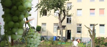 Ferienwohnung im Zentrum mit Gartennutzung