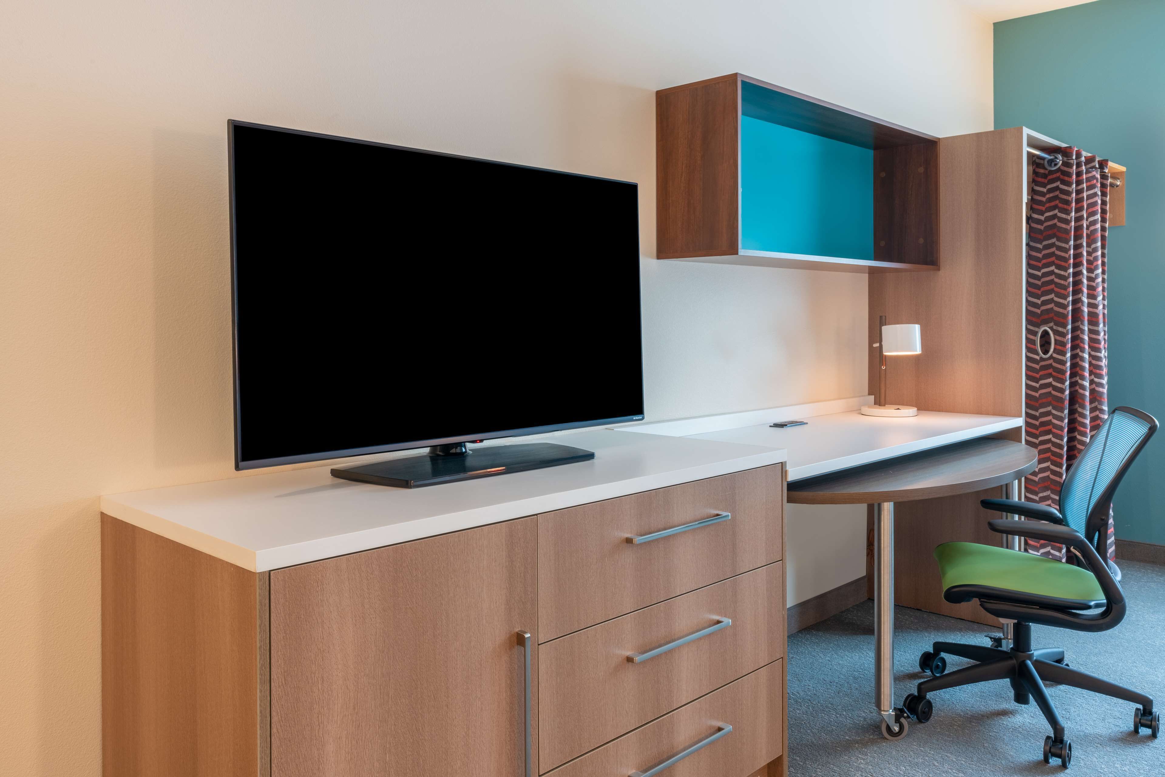 desk, laptop workspace, blackout curtains, iron/ironing board