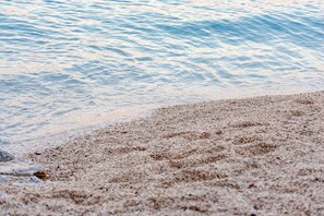 Apartment, Multiple Beds | Beach - Modern apt w. Terrace, 2 min Walk to the Beach (Okrug)