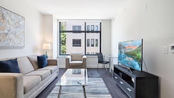 Luxury Apartment, 1 Queen Bed with Sofa bed | Living area | 50-inch flat-screen TV with cable channels, TV