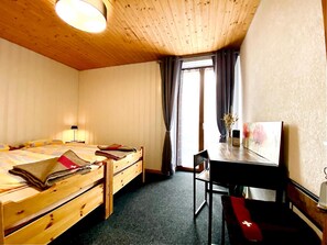 Desk, laptop workspace, blackout curtains, iron/ironing board