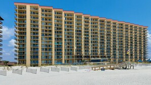 A high-rise hotel with multiple balconies and a beach view. - Best Splash Pad in town 2/2 sleeps 8 Phoenix V813 (Orange Beach)