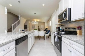 Fridge, microwave, oven, stovetop - 1807 Luxury 5 Br House w Private Pool & Game Room! (Davenport)