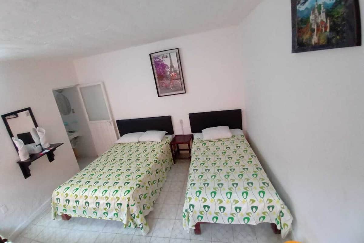 Basic Quadruple Room, 2 Double Beds | Iron/ironing board (on request), WiFi (free)