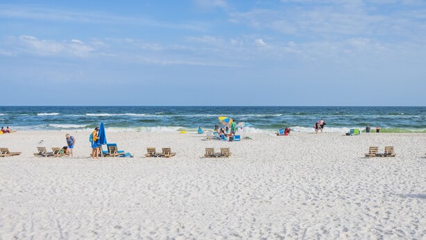 A beach with white sand, clear blue sky, and ocean waves. - Island Winds E205-Park The Car & Forget It! Location X3! OMG View! (Gulf Shores)