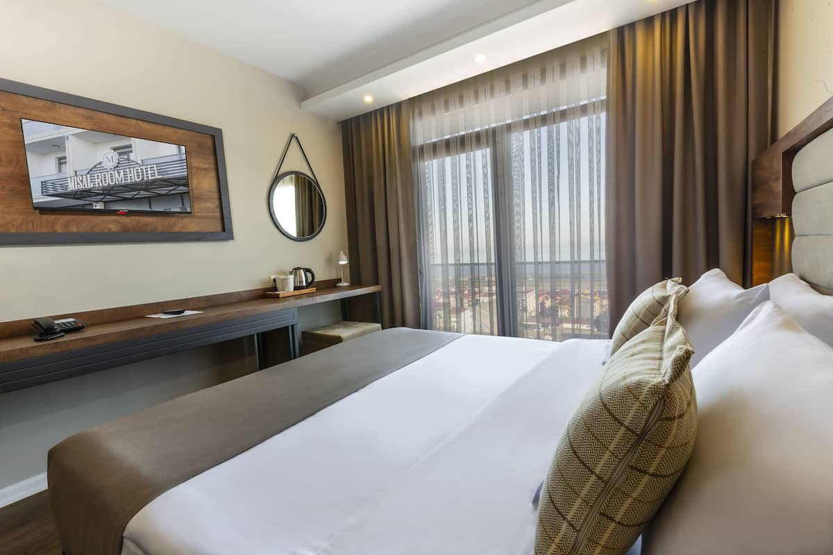 deluxe room, sea view | premium bedding, free minibar, in-room safe, free cots/infant beds