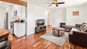 A modern living space with a kitchen, dining area, and seating area. - Greenlaw Getaway | 3BR | Spend Spring in Flagstaff! (Flagstaff)