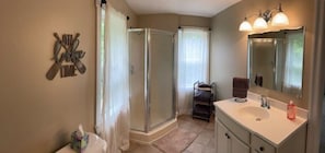 Shower, hair dryer, towels, soap