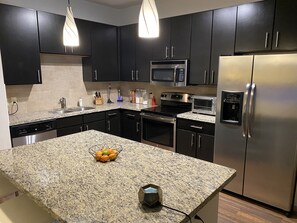 Microwave, dishwasher, cookware/dishes/utensils