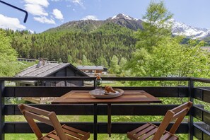 Outside dining on the balcony with lovely views of the Chardonnet