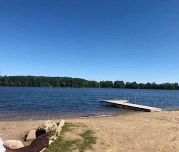 Beach - Cozy cabin retreat in rustic setting. Private lake, bonfire under the stars! (Lake)