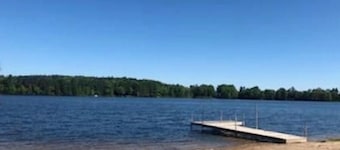 Cozy cabin retreat in rustic setting. Private lake, bonfire under the stars!