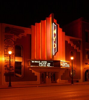 Experience the grandeur of M.Y.The. Theater, a historic venue offering live performances.