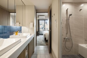 Separate tub and shower, deep soaking tub, eco-friendly toiletries