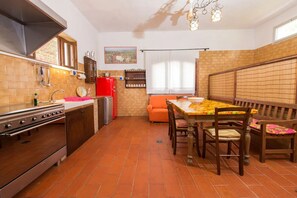 Fridge, coffee/tea maker, electric kettle, toaster