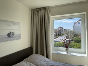 2 dormitorios, cuna de viaje, wifi gratis y ropa de cama