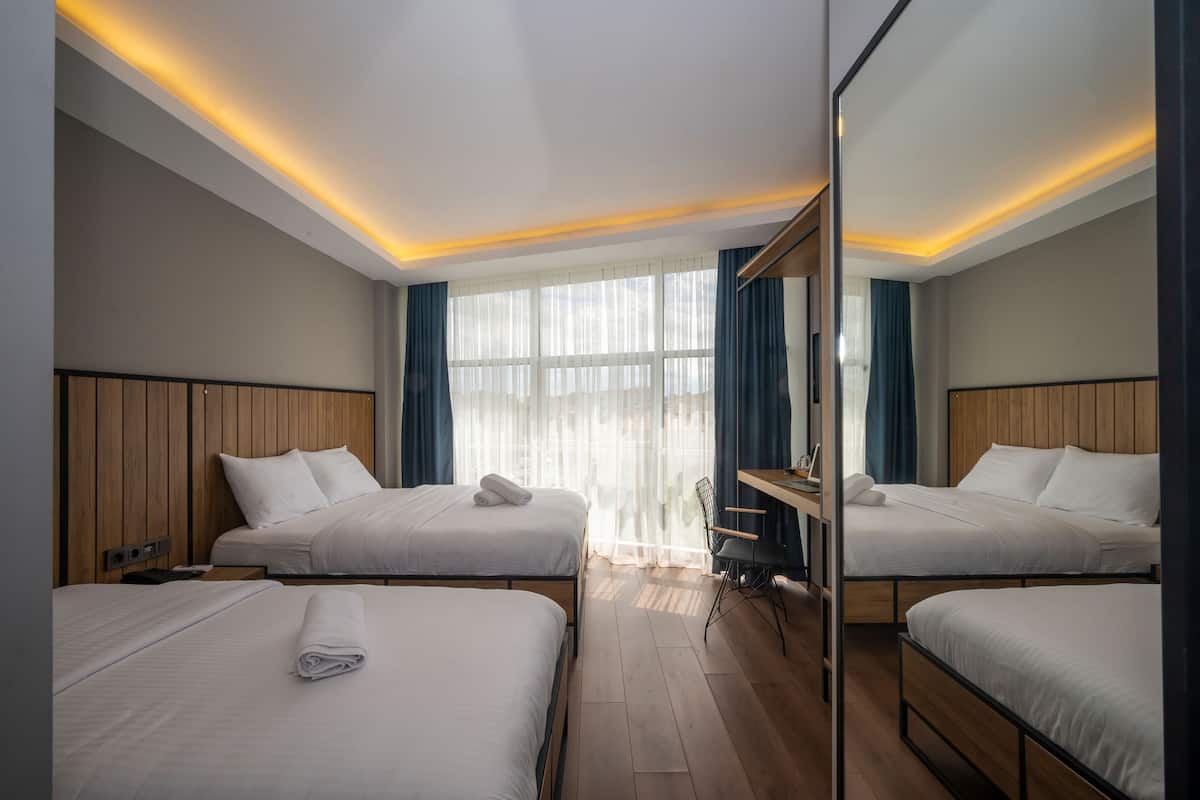 Familiekamer | Een kluis op de kamer, geluiddichte muren, gratis wifi, beddengoed