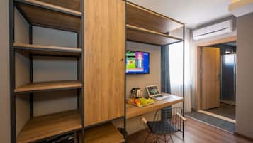 Habitació individual Deluxe | Caixa forta a l'habitació, habitacions insonoritzades i wifi gratuïta