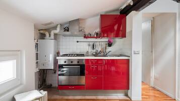 Condo | Private kitchen | Full-sized fridge, oven, stovetop, coffee/tea maker