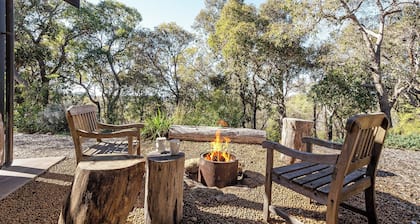 Nestled amongst the leafy trees, Gum Nuts a very Australian styled simple but sophisticated property